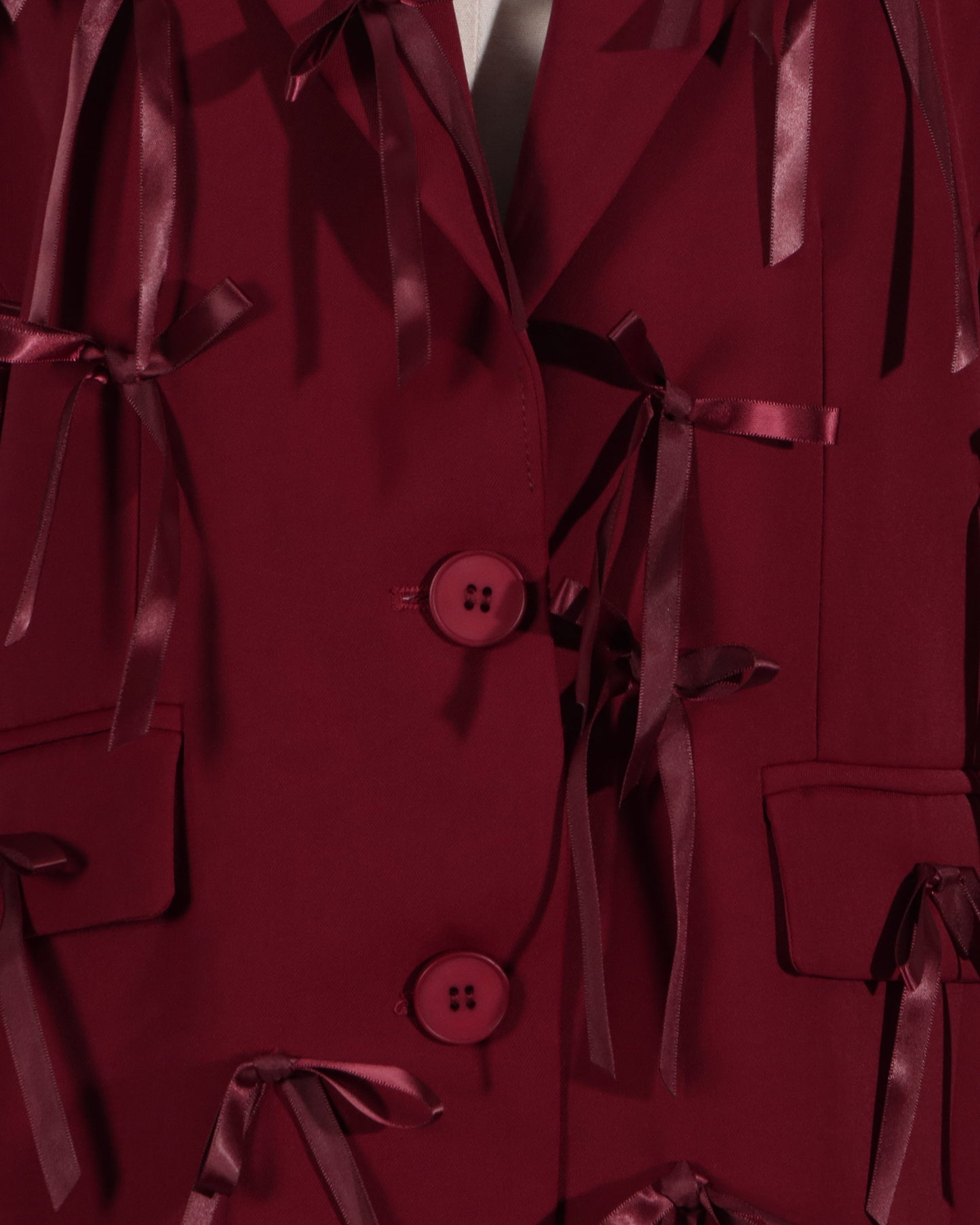 Red Blazer with Satin Bow Embellishments