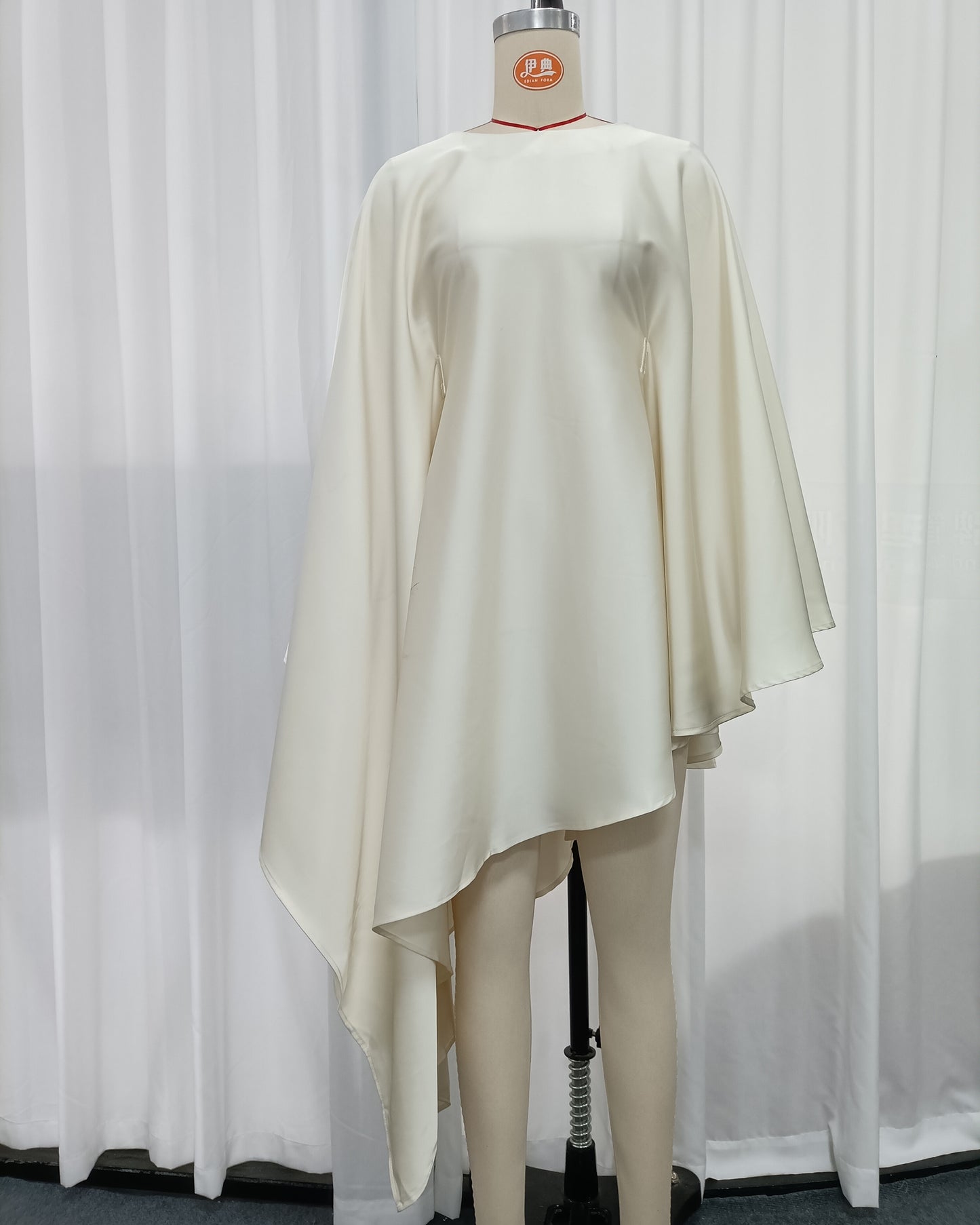 Apricot Cape Sleeve Asymmetric Top