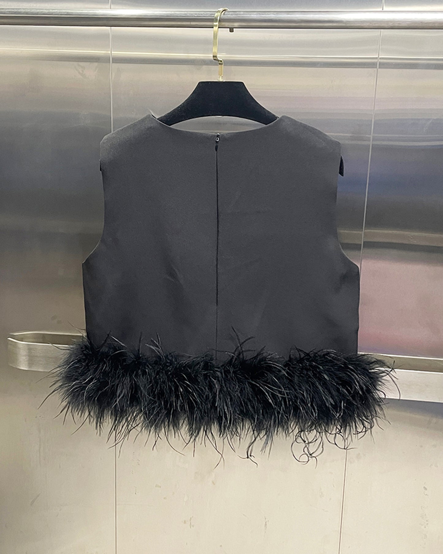 Black Sleeveless Top with Feather Hem