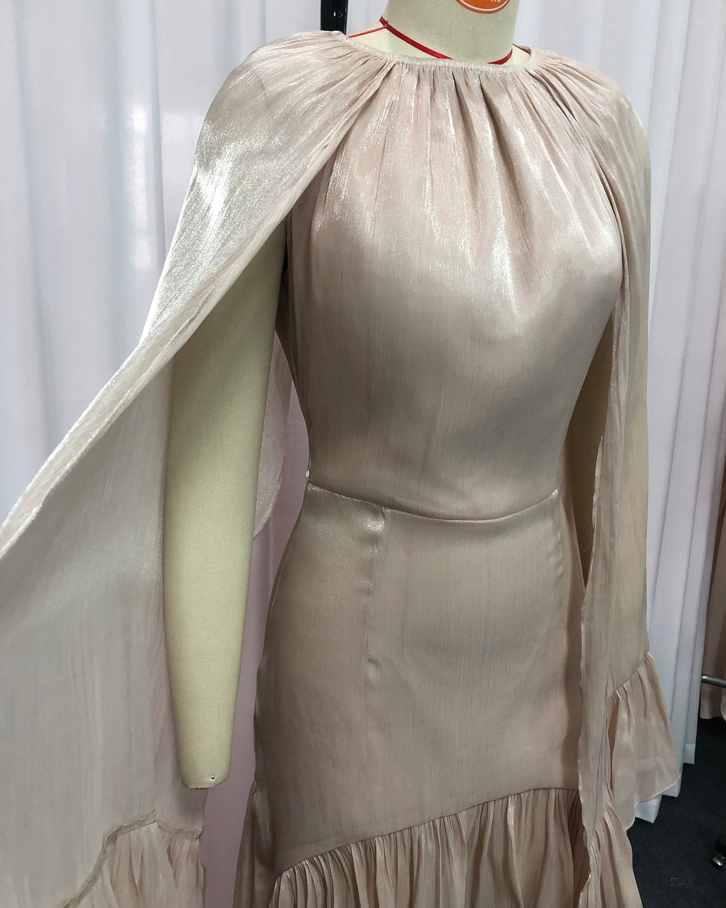 Champagne Cape-Style High-Low Ruffled Gown