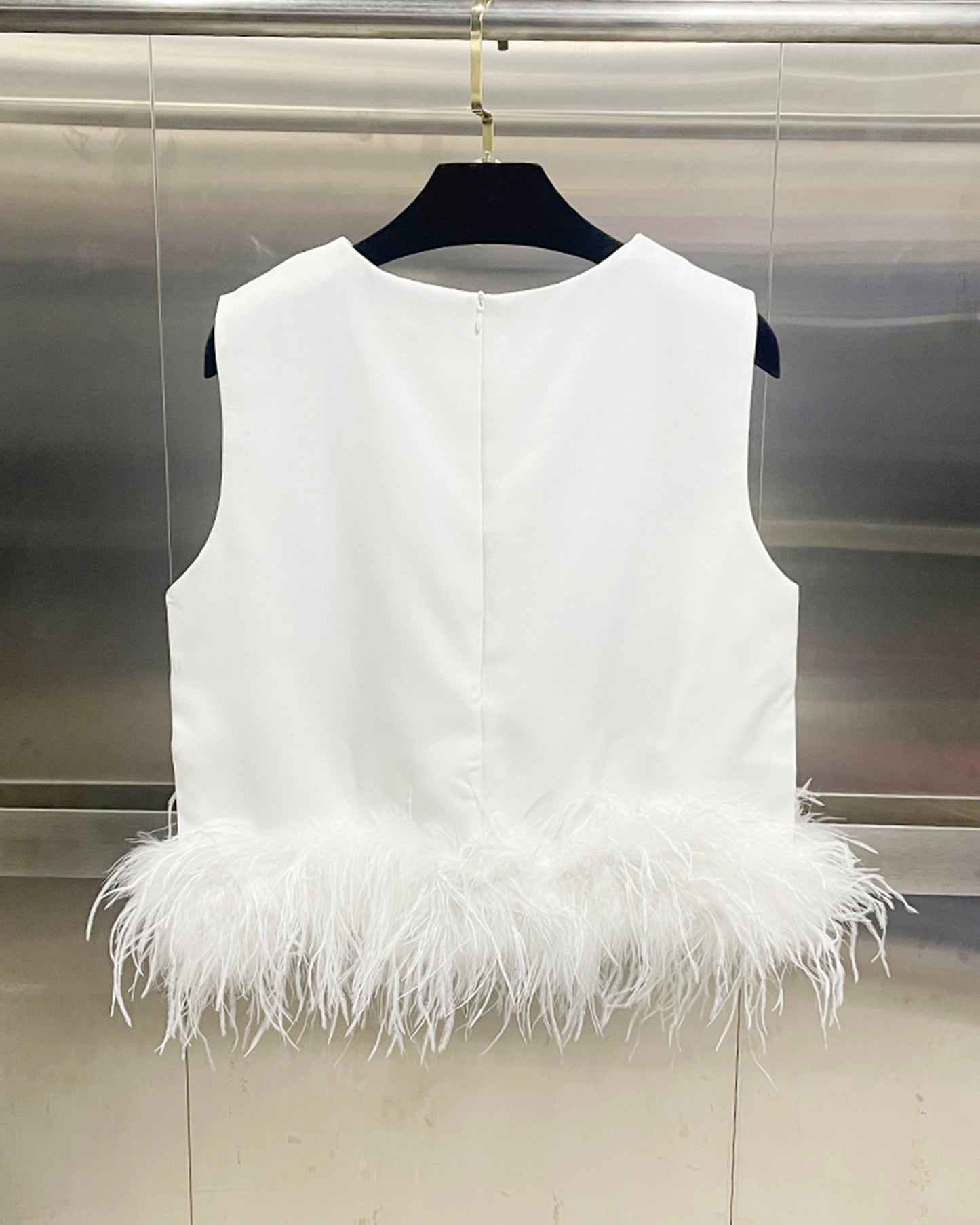 White Sleeveless Top with Feather Hem