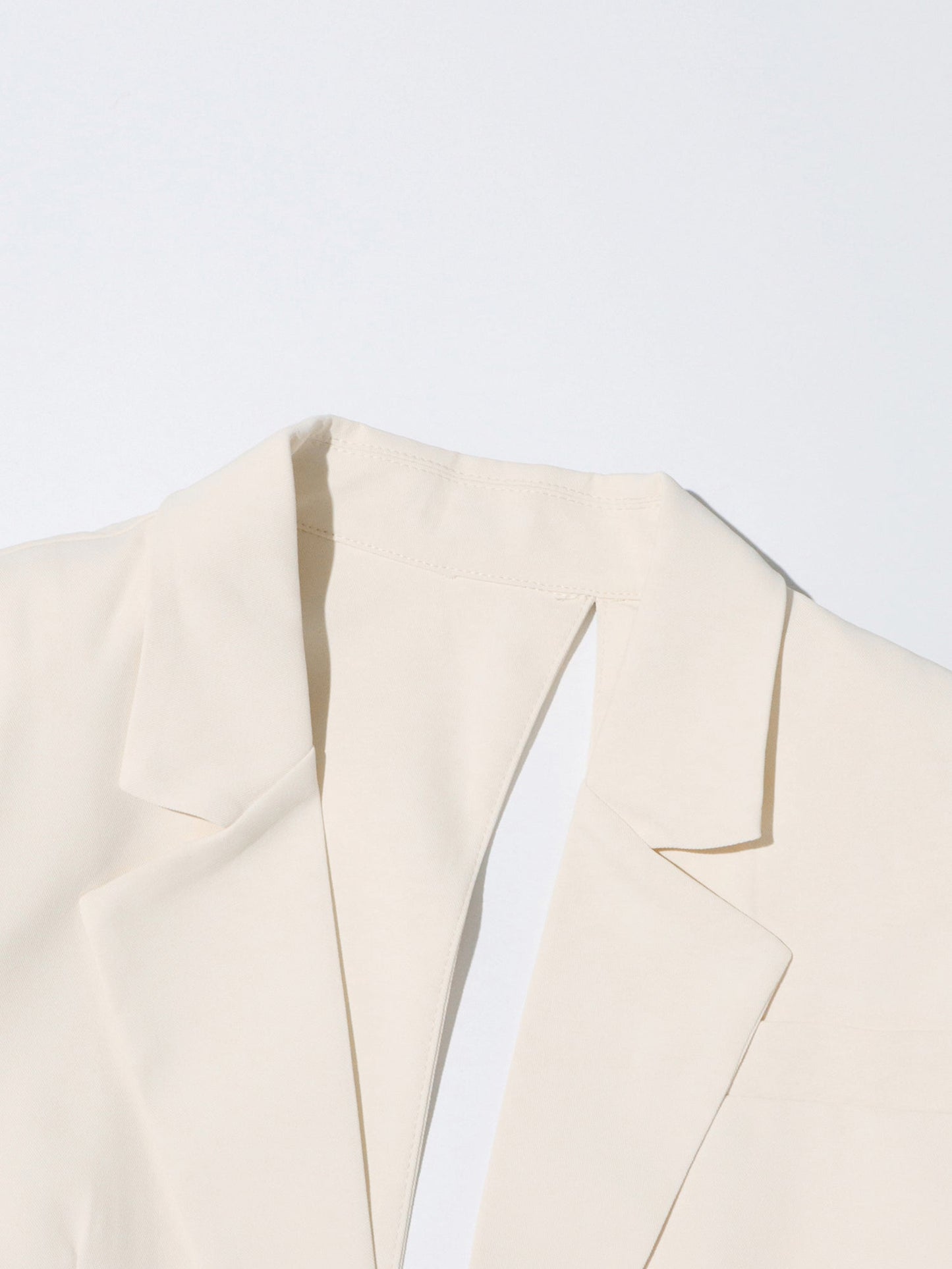 Edgy Apricot Cutout Asymmetric Blazer with Belt Detail - SISPELL